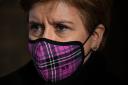 Nicola Sturgeon is to update Holyrood on Tuesday on whether the requirement to wear face masks in certain indoor settings will be relaxed.
