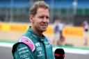 Sebastian Vettel has thrown his weight behind FIA race director Michael Masi