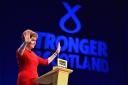 Nicola Sturgeon  acknowledges applause before her keynote speech at the SNP conference in October 2015 in Aberdeen, Scotland. Photo Jeff Mitchelll/Getty