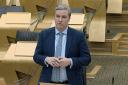 Scottish Government funding to be reduced by £390m next year