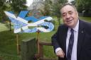 Scottish First Minister Alex Salmond outside his home in Strichen during a historic day for Scotland as voters determine whether the country should remain part of the United Kingdom..