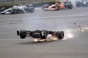 Alfa Romeo’s Zhou Guanyu crashes on the opening lap of the British Grand Prix