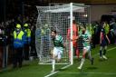 Anthony Ralston wheels away after hitting a last-gasp winner for Celtic against Ross County back in 2021, a pivotal result for the club.