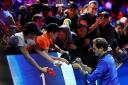 LONDON, ENGLAND - SEPTEMBER 23: Roger Federer of Team Europe signs autographs for fans during Day One of the Laver Cup at The O2 Arena on September 23, 2022 in London, England. (Photo by Julian Finney/Getty Images for Laver Cup).