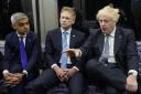 The then Prime Minister Boris Johnson with his Transport Secretary Grant Shapps and Mayor of London Sadiq Khan on an Elizabeth Line train at Paddington station to mark the completion last May of London's Crossrail project  – which was four