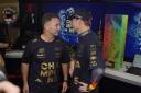 Red Bull boss Christian Horner, left, talks to his world champion Max Verstappen in Mexico where he decided to boycott Sky