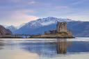 Panoramic Eilean Donan Castle.Eilean Donan Castle in Loch Duich in winter at sunset, Ross and Cromarty, Scottish Highlands, Scotland, UK. (Photo by: Sven-Erik Arndt/Arterra/Universal Images Group via Getty Images)
