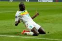 Senegal captain Kalidou Koulibaly celebrates scoring at the World Cup
