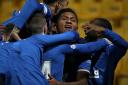 Alfredo Morelos of Rangers celebrates with team mates after scoring their side's first goal during the Ladbrokes Scottish Premiership match between Livingston and Rangers at Tony Macaroni Arena on March 03, 2021