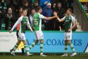 Hibs players celebrate after Will Fish opened the scoring against Kilmarnock at Easter Road (SNS)