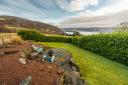 Situated on the edge of the protected Abriachan community woodland in the hills above Loch Ness, this home boasts a fabulous location