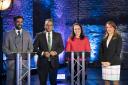 Presenter Krishnan Guru-Murthy (second left) with SNP leadership candidates Humza Yousaf (left), Kate Forbes (second right) and Ash Regan (right) on set before taking part in the SNP leadership debate, broadcast on Channel 4, from The Engine Works in