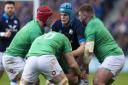 Scott Cummings finds himself surrounded by the Irish during Scotland's defeat at BT Murrayfield