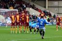 Rangers' James Tavernier scores their side's first goal of the game during the cinch Premiership match at Fir Park