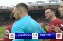 Liverpool vs Arsenal descends into chaos as Andy Robertson 'elbowed' by linesman
