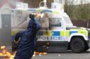 Call for calm after police targeted with petrol bombs in Northern Ireland
