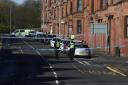 Streets sealed off by police after man dies and another injured