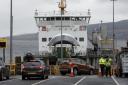 Vehicles board the CalMac ferry MV Bute at Wemyss Bay for Rothesay (Colin Mearns)