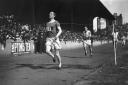 1924:  Scottish athlete Eric Liddell (1902 - 1945) winning the 440 yards race at the Amateur Athletics Association championships at Stamford Bridge, London, UK. Eric Liddell, known as the 'Flying Scotsman' went to the Paris Olympics in 1924 as