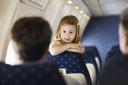 A young girl on a plane