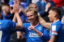 Rangers' Todd Cantwell (centre) celebrates scoring their side's first goal of the game during the cinch Premiership match at Ibrox
