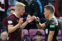 Hearts defender Alex Cochrane protests his innocence to referee Nick Walsh at Tynecastle on Sunday