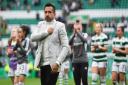 Celtic women's manager Fran Alonso salutes the fans