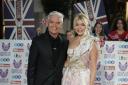Holly Willoughby should follow Phillip Schofield “out the door” of This Morning, Eamonn Holmes has said (PA)