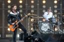 Mike Kerr (left) and Ben Thatcher of Royal Blood performing (Ben Birchall/PA)