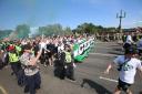 Celtic fans march through city