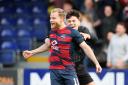 Josh Sims celebrates after hitting the winning penalty for Ross County against Partick Thistle.
