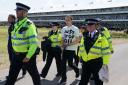 Four Just Stop Oil protesters were arrested after disrupting the Open at Royal Liverpool (Richard Sellers/PA)