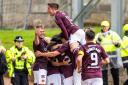 Hearts players celebrate Yutaro Oda's goal against St Johnstone at McDiarmid Park today