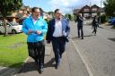 Craig Hoy, left, and Thomas Kerr campaigning in Rutherglen for the Scottish Conservatives.