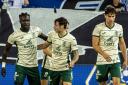 Elie Youan, left, is congratulated by his Hibernian team mates after opening the scoring in the UEFA Conference League match against Luzern in Switzerland tonight