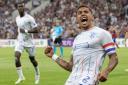 Rangers captain James Tavernier celebrates his goal against Servette in a Champions League qualifier in Switzerland on Tuesday night