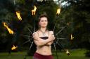 Iga Sobieraj now teaches the skill of fire spinning in Edinburgh meadows.