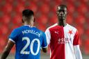 Abdallah Sima, right, shakes hands with Alfredo Morelos after Slavia Prague had played Rangers in the Europa League in 2021