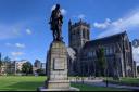 The statue of ornithologist Alexander Wilson next to Paisley Abbey