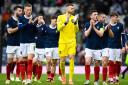 Scotland's players applaud their fans at Hampden after a Euro 2024 qualifying victory