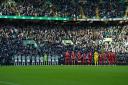 Celtic and Aberdeen players ready to observe a period of silence