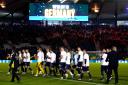Scotland's players do a lap of honour at Hampden on Sunday night after their draw with Norway