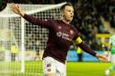 Hearts captain Lawrence Shankland celebrates scoring the winner against Hibernian at Easter Road on Wednesday night