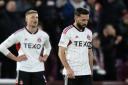 Graeme Shinnie dejected at Tynecastle