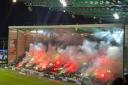 A huge pyro display from Celtic supporters at Easter Road