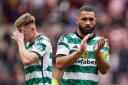Celtic captain Cameron Carter-Vickers applauds the Parkhead club's fans at Tynecastle on Sunday