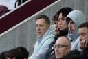 Celtic captain Callum McGregor watched on from the stand as his team went down to Hearts at Tynecastle.