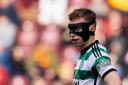 Celtic right back Alistair Johnston wearing a protective face mask in the cinch Premiership game against Motherwell at Fir Park last month