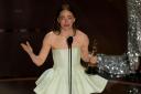 Emma Stone accepts her Oscar