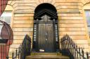 The Glasgow Society of Lady Artists in Blythswood Square. Charles Rennie Mackintosh designed interiors and the striking neo-classical front door.